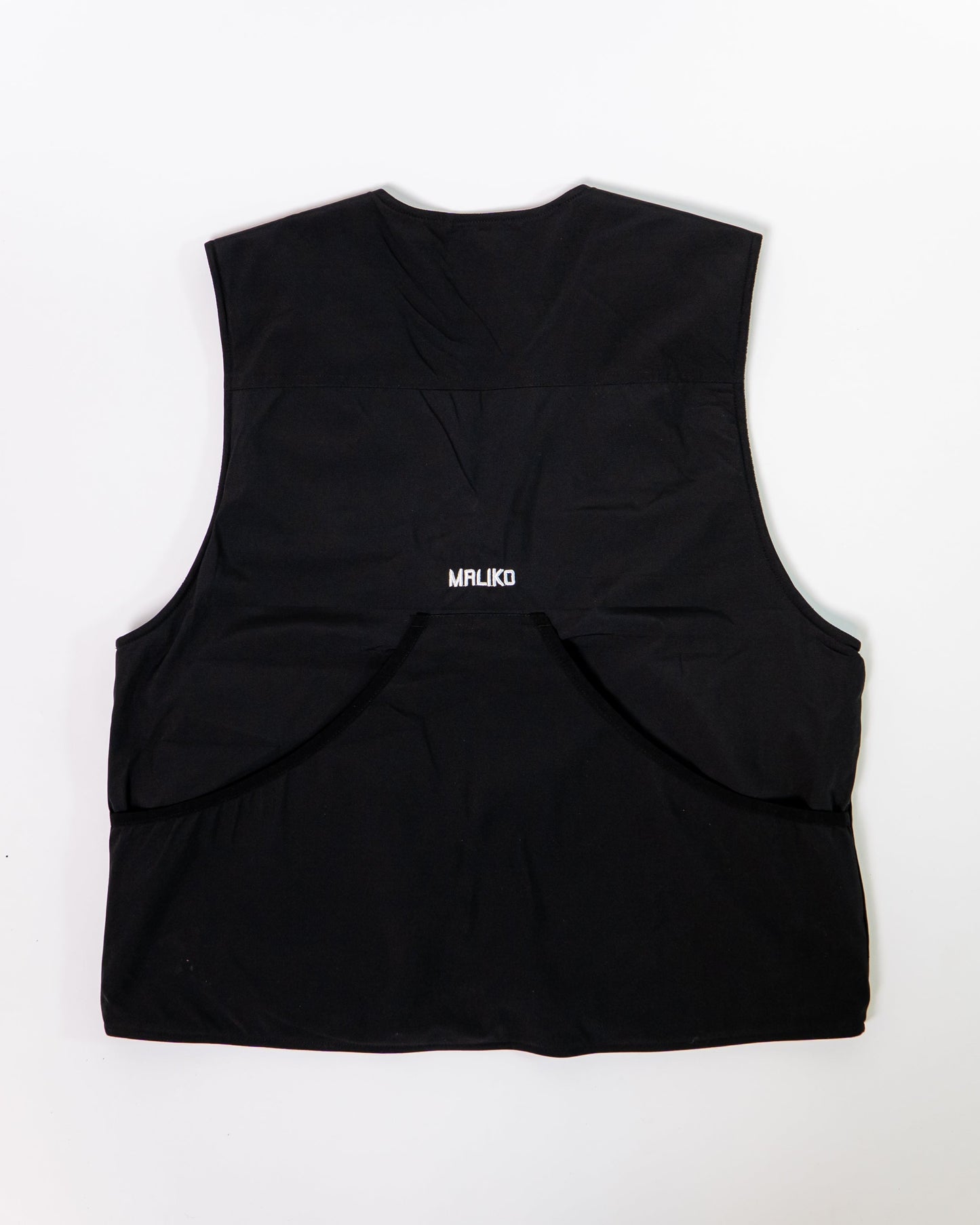 A black dog handler vest with MALIKO logo and big waterproof pocket