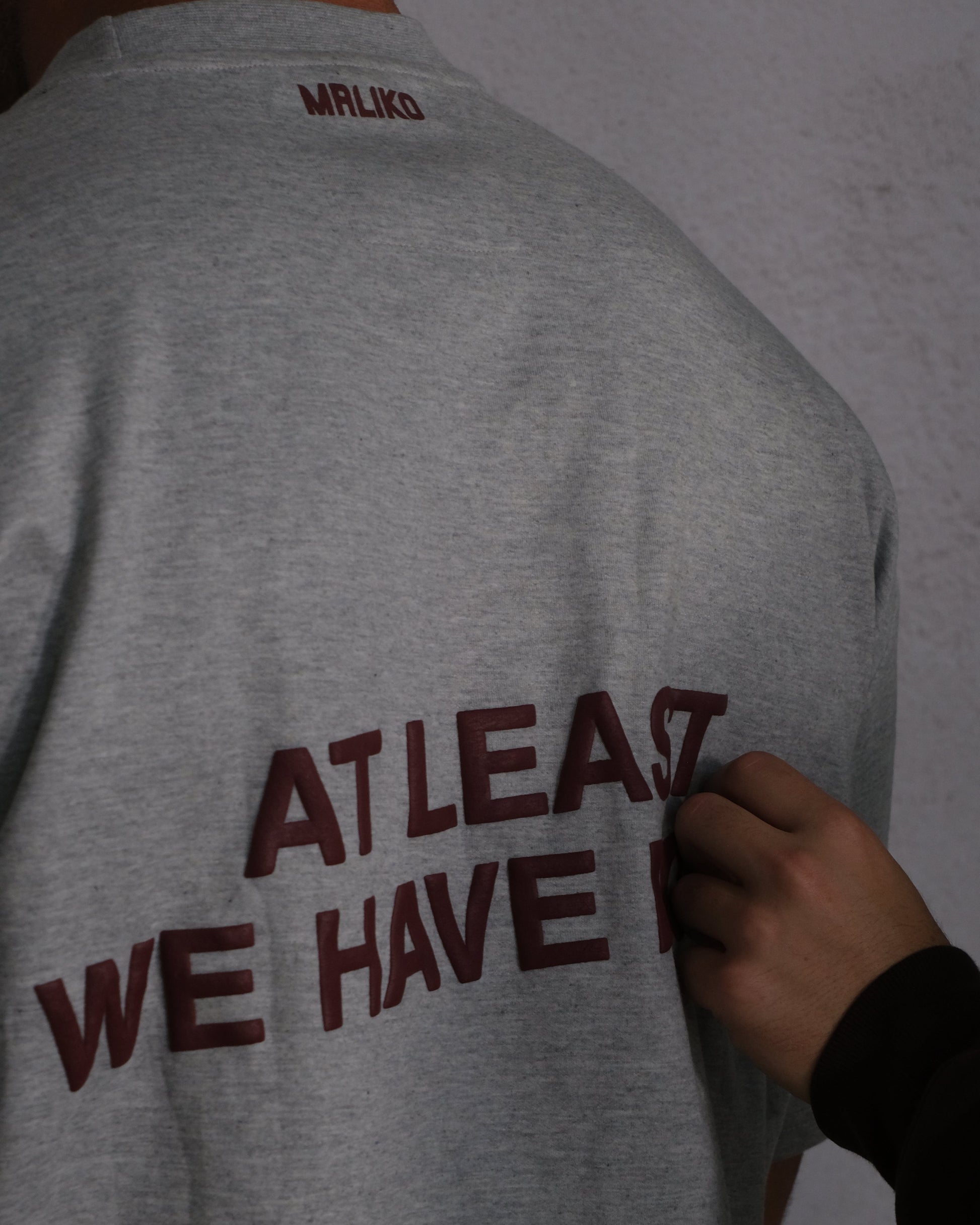 man wearing oversized t shirt