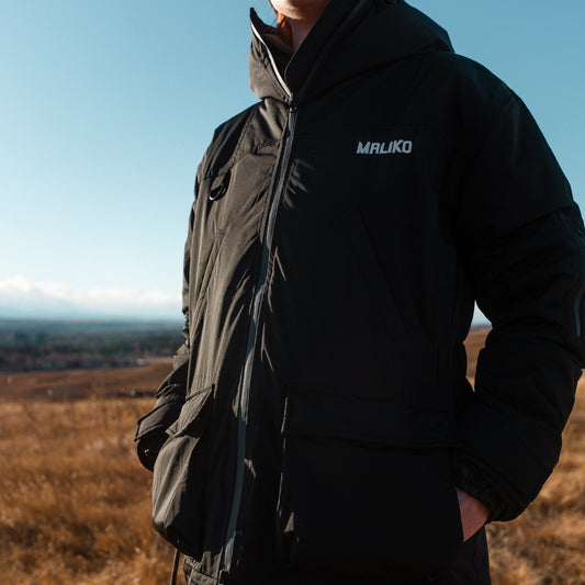 woman wearing maliko dog training coat