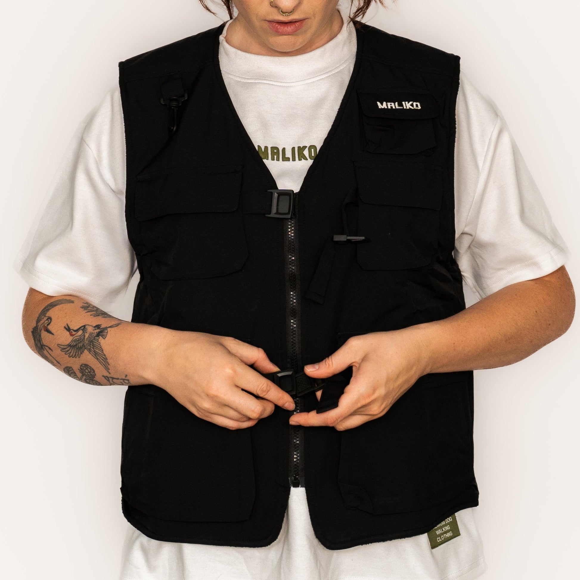 woman wearing a dog training gilet