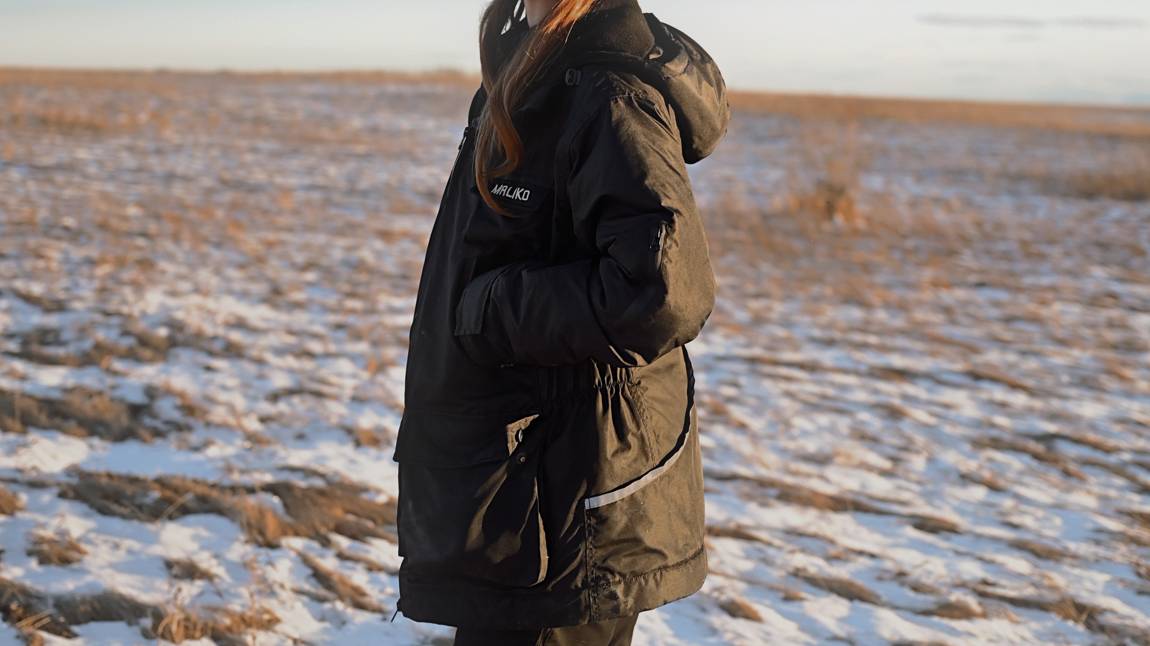 Woman in dog walking coat